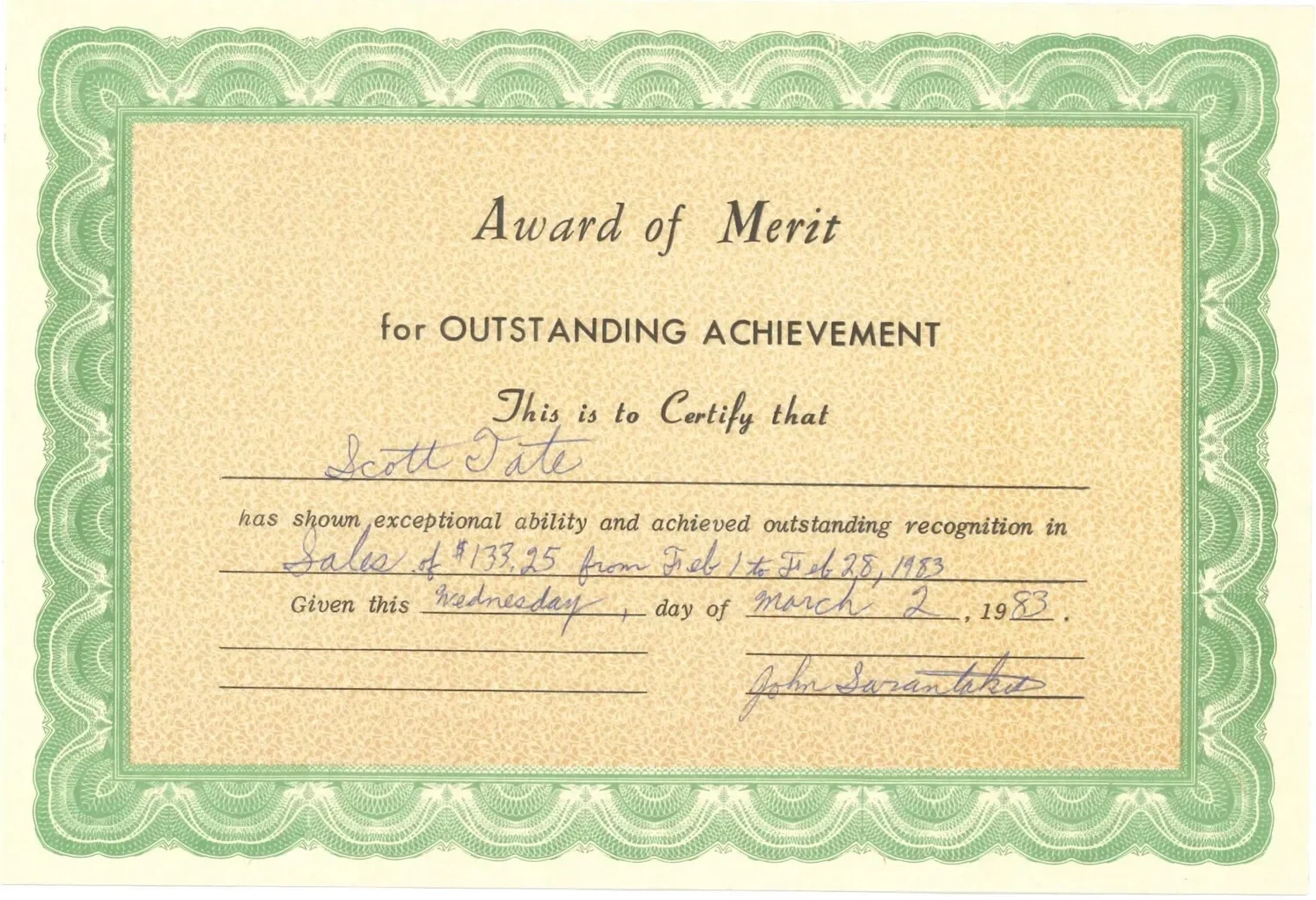 A March 1983 People’s Choice Award of Merit for outstanding achievement presented to Scott Tate for sales of $133.25.