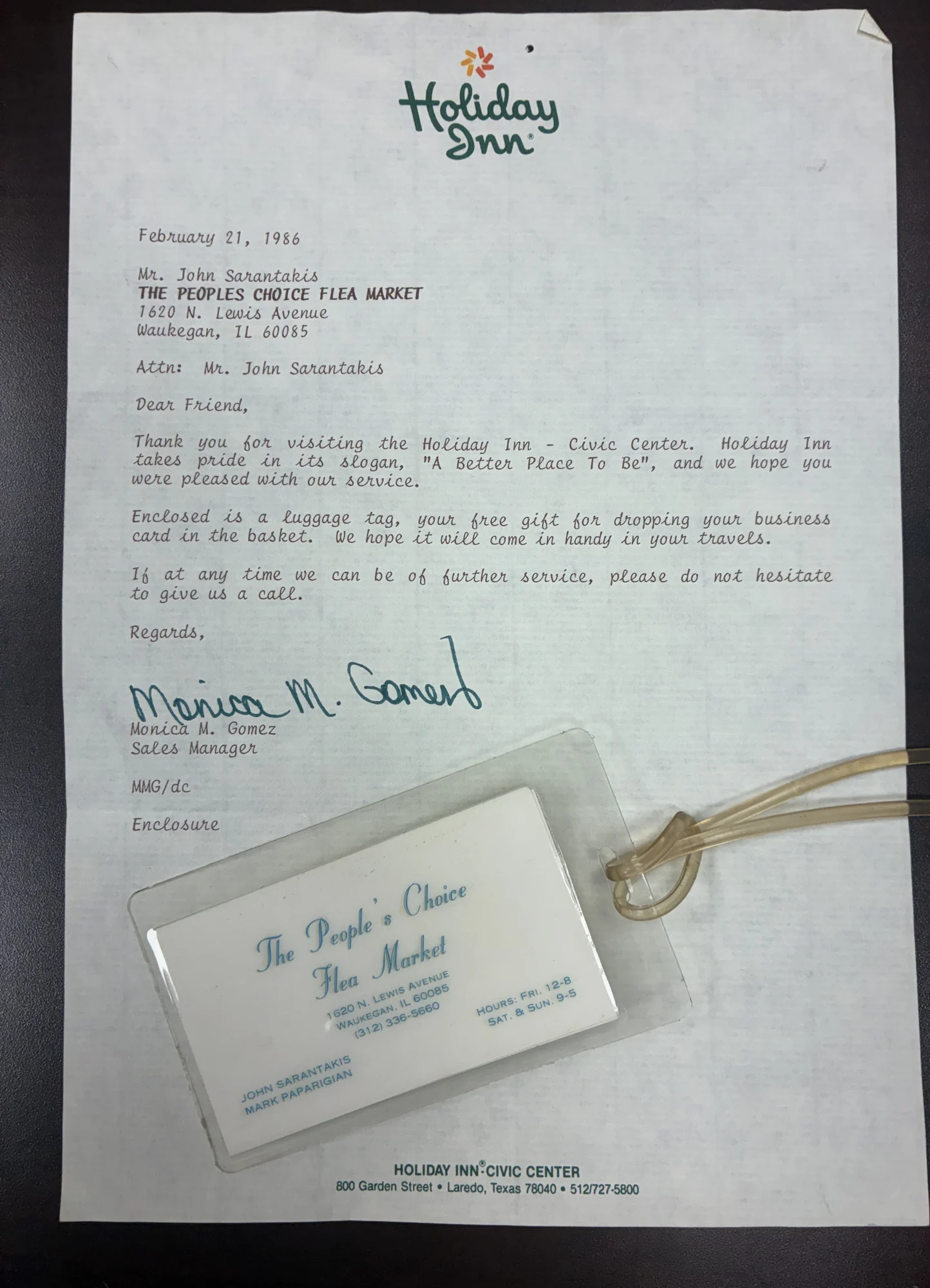 A February 21, 1986 Holiday Inn letter to John Sarantakis of The People’s Choice Flea Market, with the enclosed luggage tag holding a People’s Choice Flea Market business card.