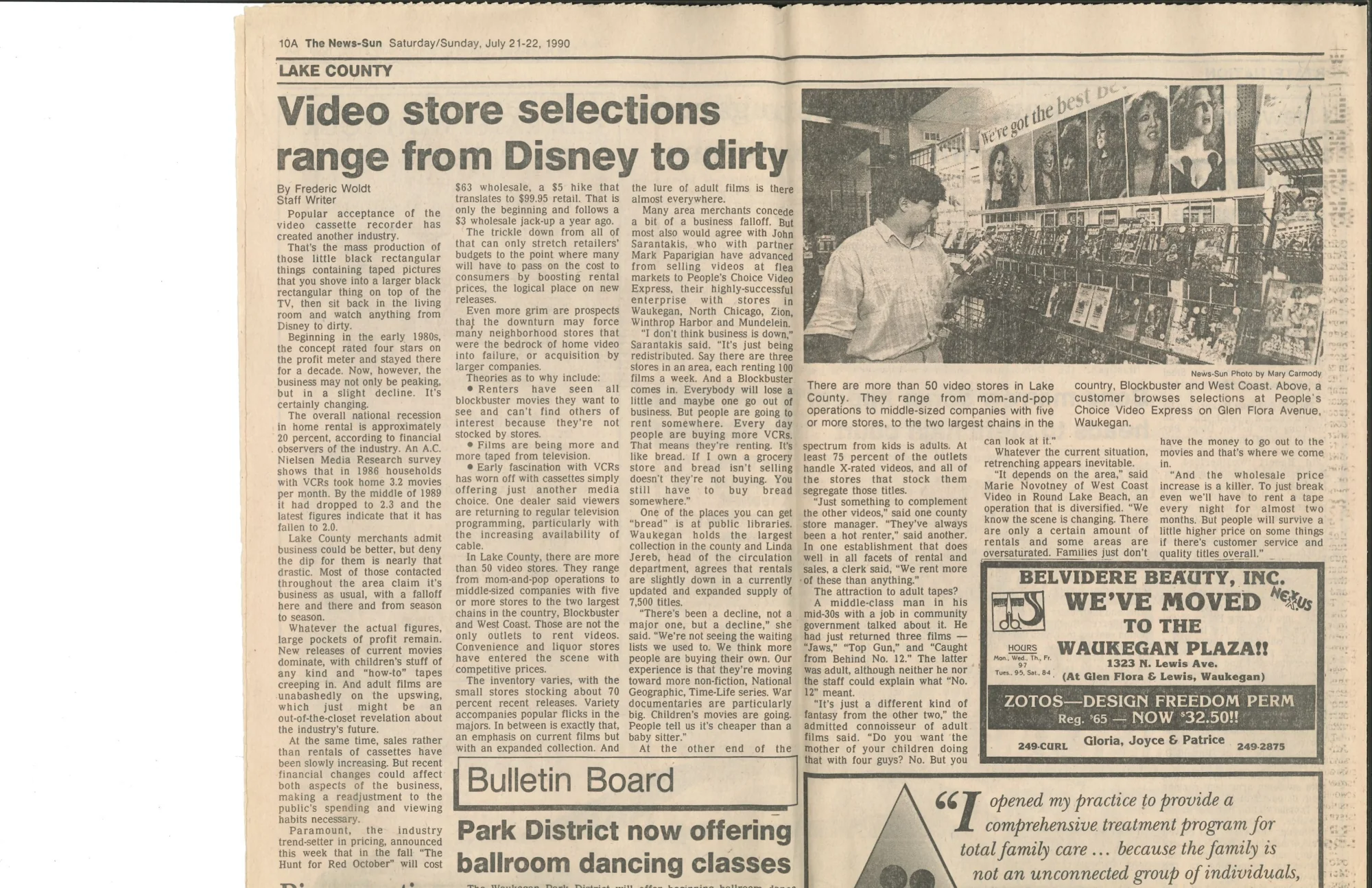 The July 21-22, 1990 News-Sun Lake County article about video stores, quoting John Sarantakis of People’s Choice Video Express, with a photo of a customer browsing at the Glen Flora store.