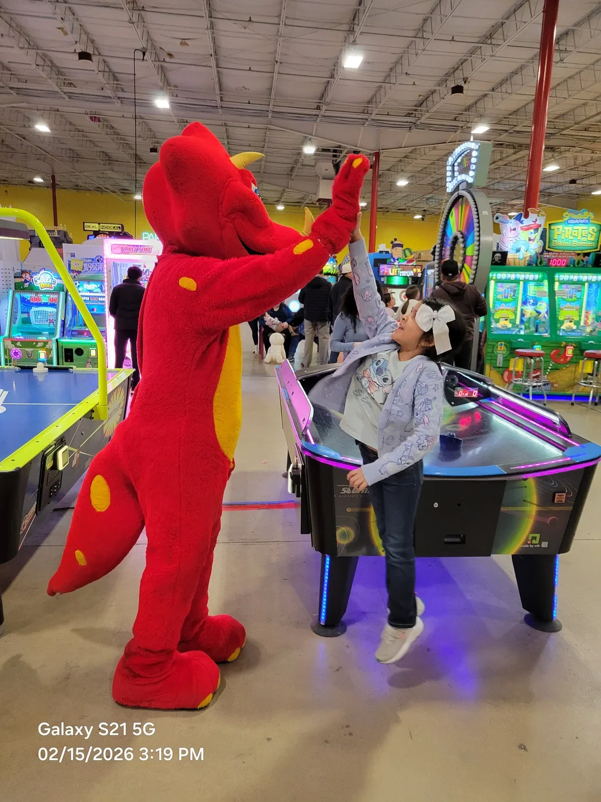 Rocky greets a guest on the People’s Choice arcade floor.